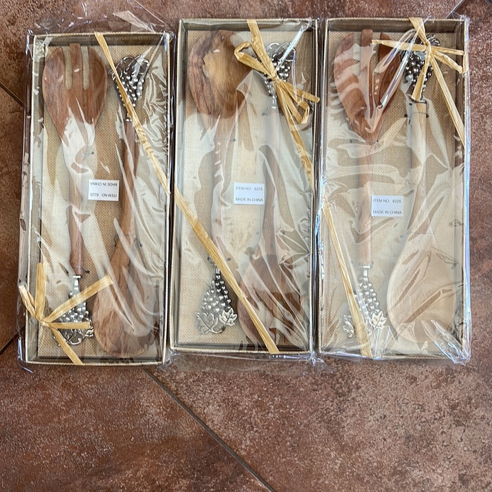 Set of 2 Salad spoons set. Must buy all. $5.00 a box 42 are available